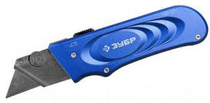 Нож ЗУБР "ЭКСПЕРТ"с трапециевидным лезвием тип А 24, автом, касета для хранения лезвий 0923_z01